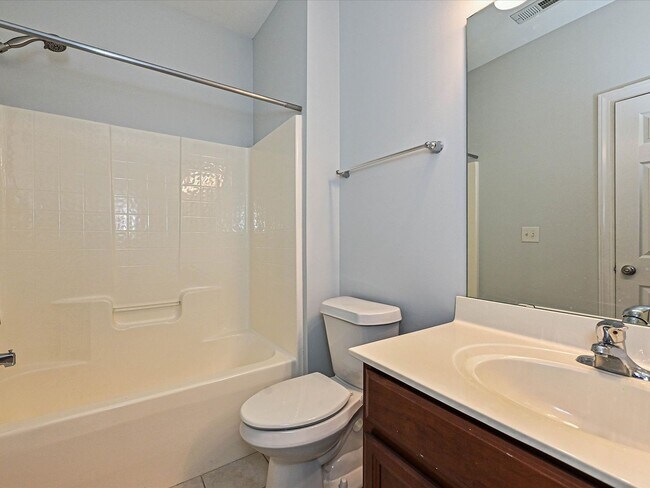 Building Photo - Stylish Condo Living with Open Concept, Garage & Outdoor Space