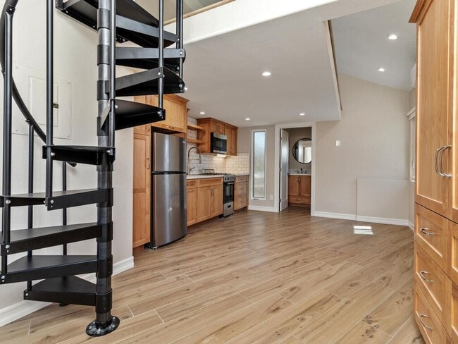 Building Photo - Studio with Loft, Private Patio, and All U...