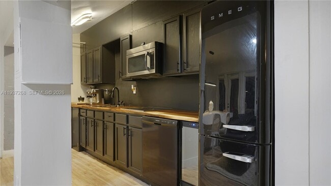 Building Photo - 1645 NE 9th Ave