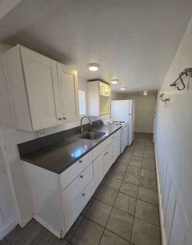 Building Photo - MOVE-IN SPECIAL! Charming 1BD/1BA Normal Heights Home w/ SOLAR and Private Fenced Yard