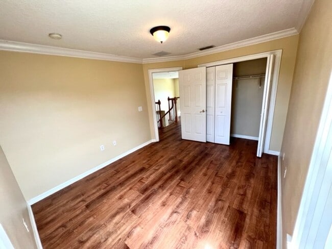 Building Photo - EAGLE CREEK LAKE NONA! WELCOME HOME! Beautiful water views! Spacious 2 story-3 bedroom 2.5 bath h...