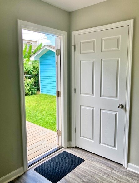 Rear Bedroom opens to Backyard - 1223 E Waldburg St