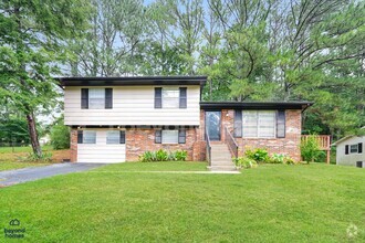 Building Photo - Beautiful brick-front 3 bedroom / 1 full b...