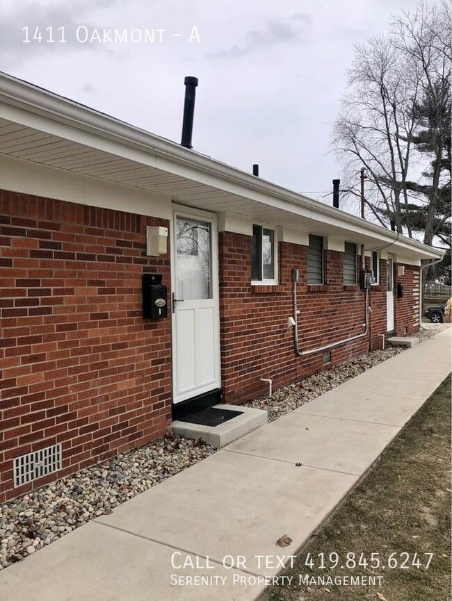 Building Photo - 1411 Oakmont-A