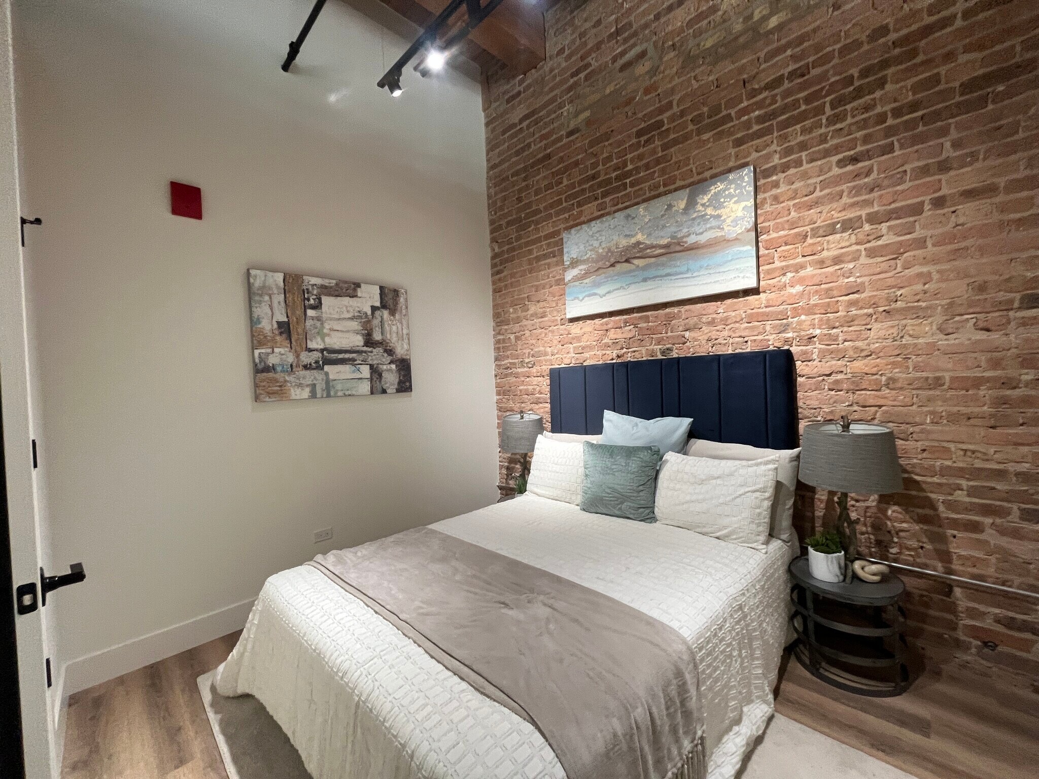 Exposed brick in select units. - 151 W Ohio St