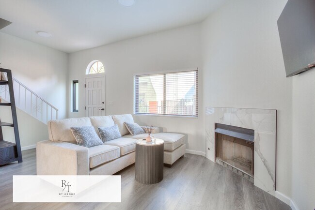 Building Photo - Fully Remodeled | Spacious & Bright Townhome