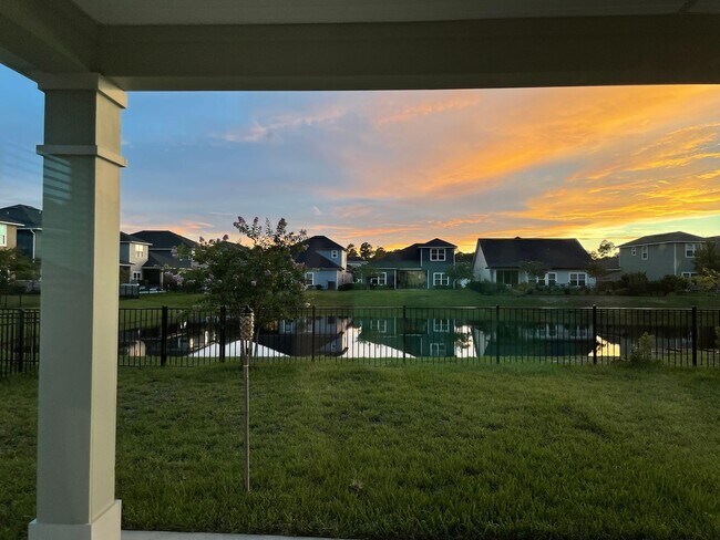 Building Photo - Beautiful Pond-Front Home Near Amelia Concourse