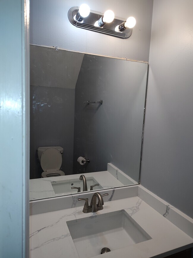 Half bathroom - 899 Joseph Club Dr SW