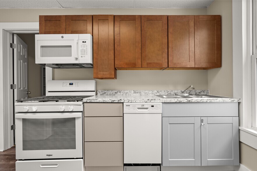 Kitchen, stove/oven, dishwasher, sink, cabinets - 334 1st St