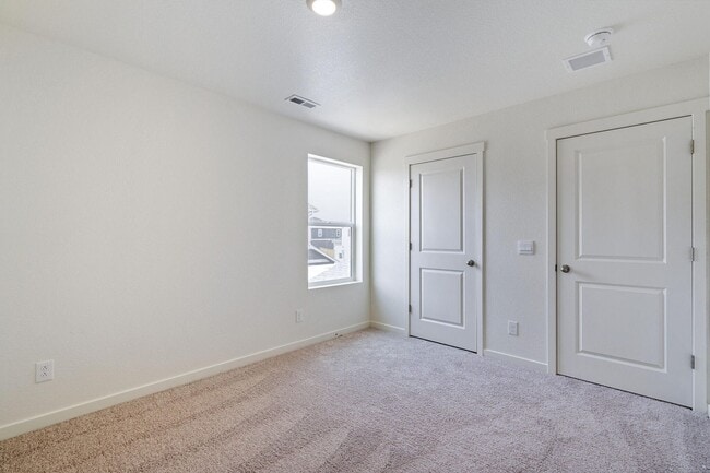 Building Photo - Spacious 4-Bedroom Wellington Home with 3-Car Garage, Loft & Fenced Backyard!