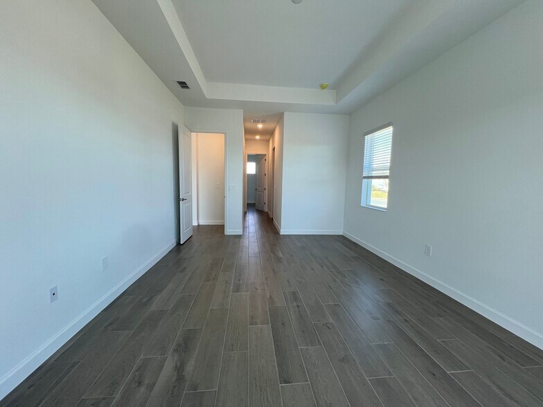 Main bedroom from pool sliding door - 8006 Lakes Edge Ln