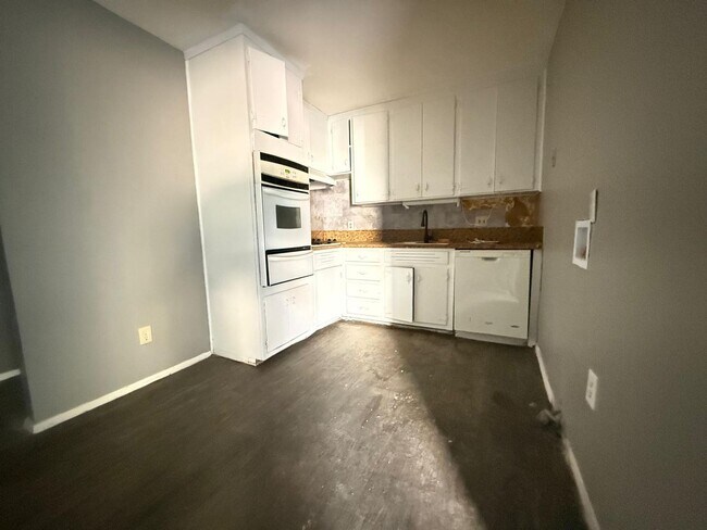 Building Photo - For Rent — Spacious & Affordable 4 Bedroom Home!