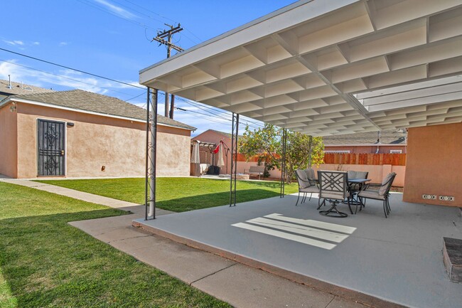 Building Photo - Stunning Remodeled Corner-Lot Home – An En...