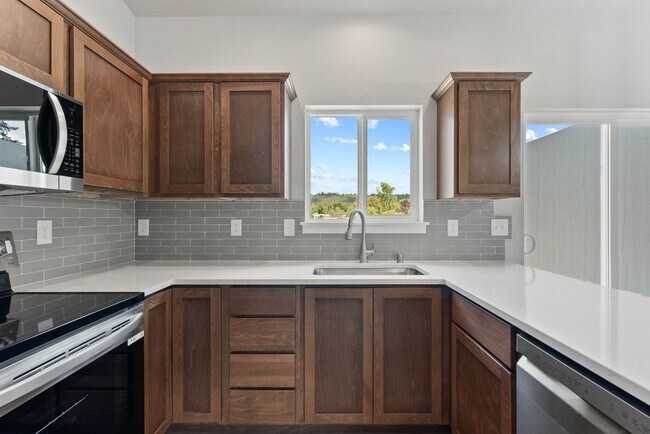 Building Photo - Newly built 4 Bedroom Duplex With Garage