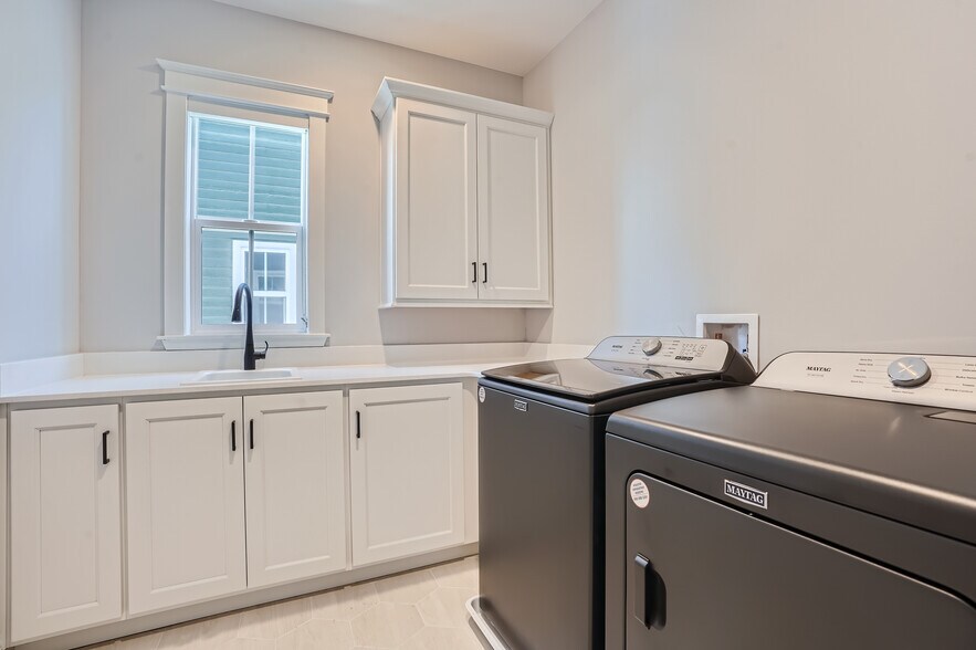 laundry room - 21235 E 61st Dr