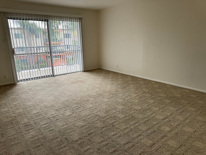 Living Room with door to patio - 400 N Acacia Ave
