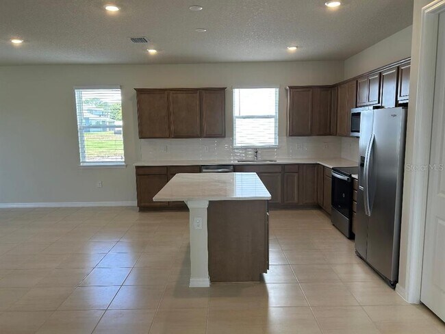 Building Photo - 5548 Settlingstone Ln