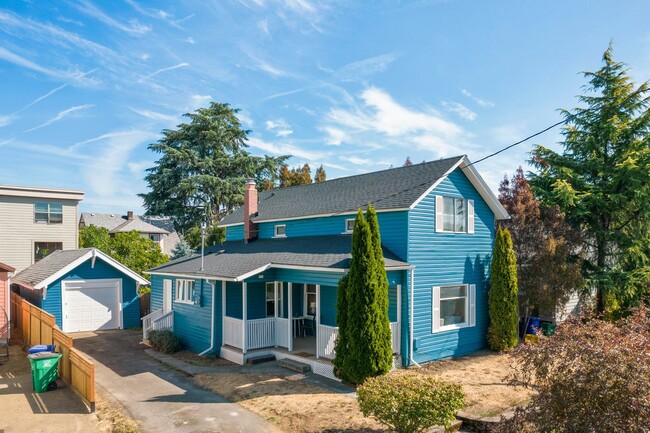 Building Photo - 1/2 Month Free! Storybook Farmhouse - Updated Kitchen, A/C, Basement, Fenced Yard, Garage, Laundr...