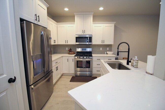 Building Photo - New Construction 3 Bedroom Townhome at Ple...