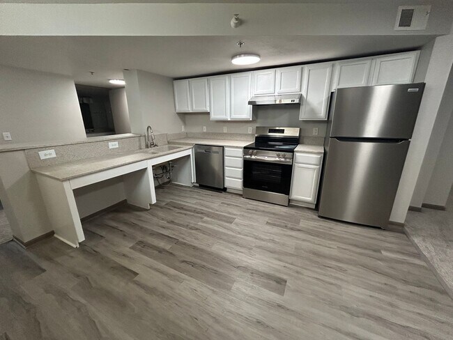 Building Photo - Solid surface countertops, stainless steel...