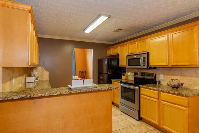 Building Photo - 4235 King Arthur Pl