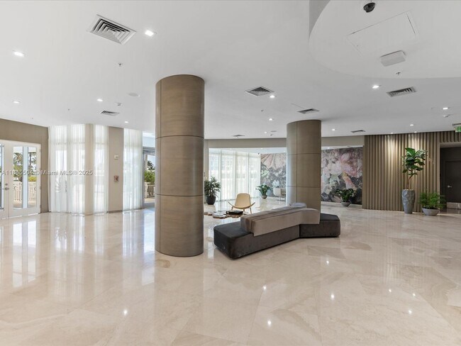 Building Photo - 10275 Collins Ave