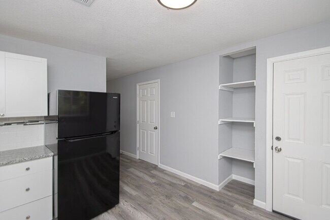Building Photo - Live more for less!