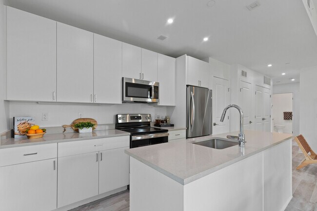 Kitchen with Island - Six55 Detroit