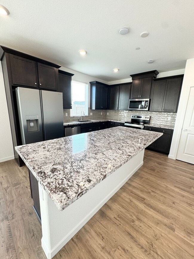 Building Photo - BRAND NEW 5 Bedrooms 3 Full Baths Solar Included Blossom Plan at Lilly Community SEE VIDEO