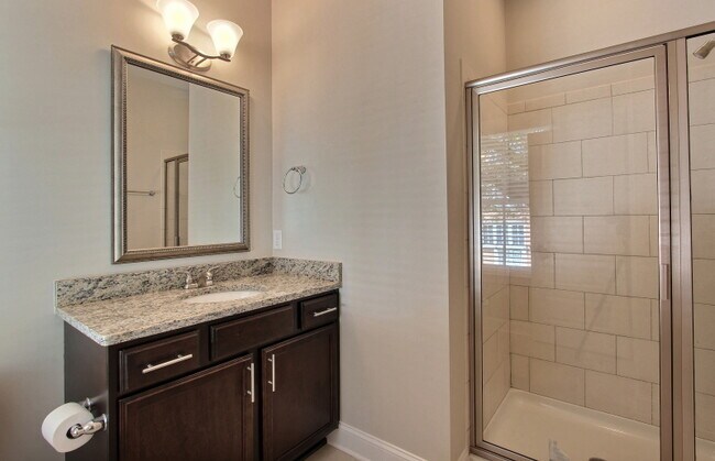 Building Photo - Stunning 3 bed/2.5 bath townhouse with Gated Parking and Energy Efficiency