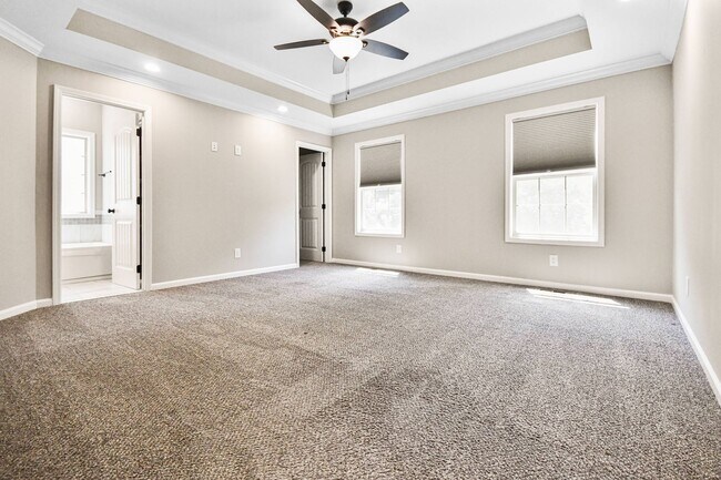 Building Photo - Pet Friendly Three Bedroom with Bonus!