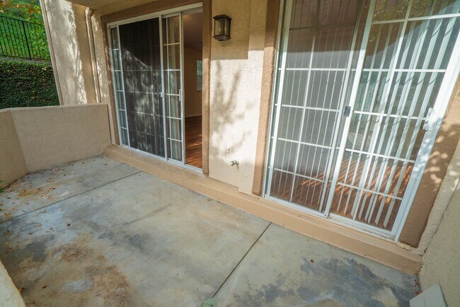 Building Photo - 2-Bedroom Condo with some Utilities Includ...