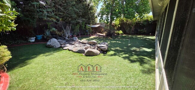 Building Photo - 3 Bed | 2 Bath Home with Office, Sunroom, Outdoor Kitchen & Backyard Oasis