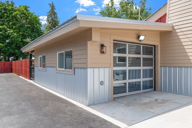 Building Photo - Complete Rebuild Modern Finishes 3 Bedroom 2 Bath Spokane Valley Home fenced backyard