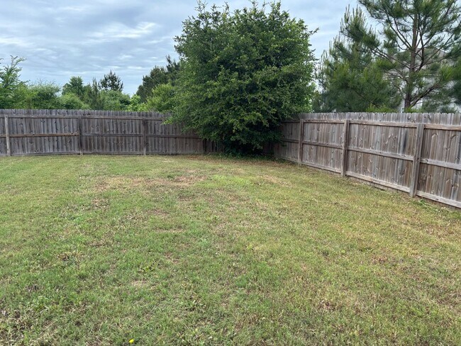 Building Photo - This property blends ample living space and storage with functional amenities.