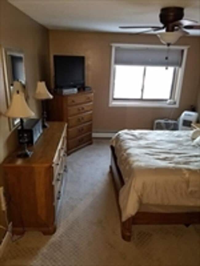 Building Photo - Modern Comfort Meets Convenience in This Stylish Franklin Condo