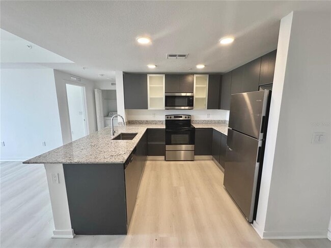 Building Photo - 5579 Millennia Park Dr