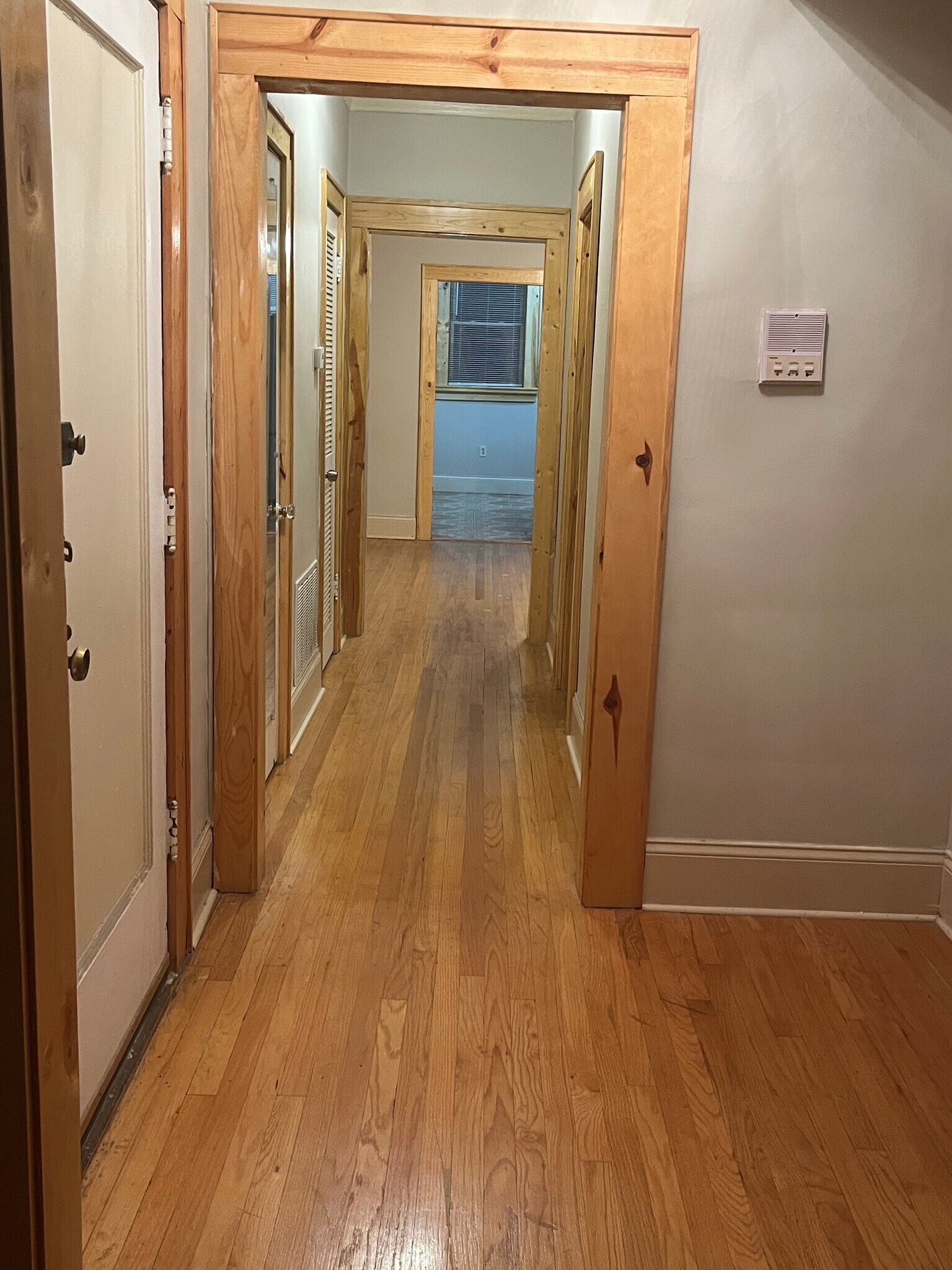 Hallway from front room view through kitchen - 7619 S Phillips Ave