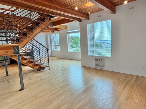 Building Photo - Industrial-Style Queen Anne Townhome with water views on every floor! AVAILABLE NOW!