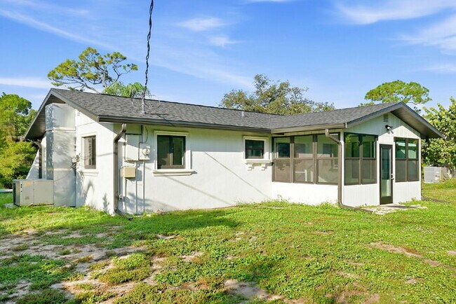Building Photo - Fully Renovated 3/2 Near Manasota Beach with a Sunroom and a Big Backyard