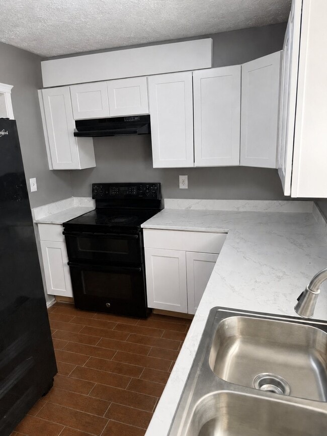 Building Photo - 6432 Woodstone Way