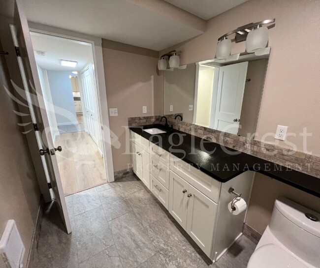 Building Photo - Lovely Two-Bedroom Condominium Located in ...