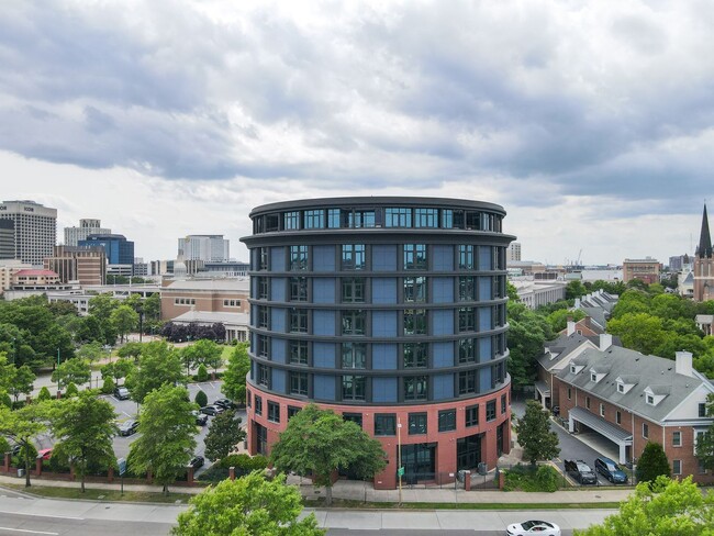 Building Photo - Industrial-Themed Mid-Rise, One-Level Cond...