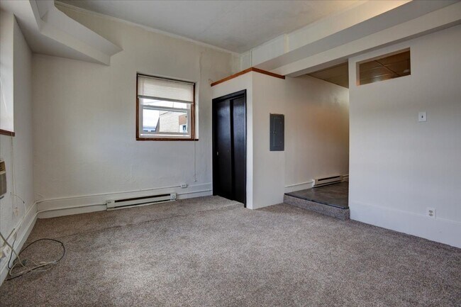 Building Photo - Cozy Studio Apartment - Menomonie, WI