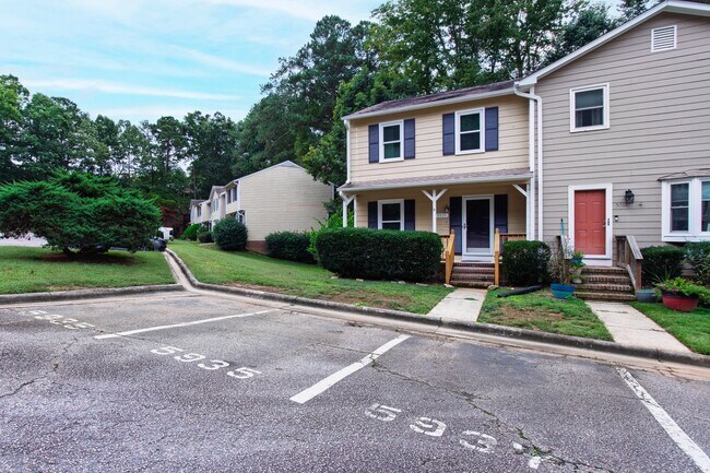 Building Photo - Rare Find: Updated and Modern End-Unit Tow...