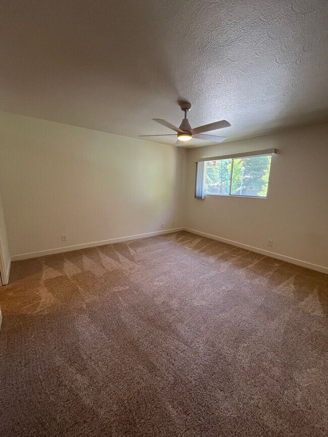 Building Photo - Charming 2-Story Condo on Greenbelt-$500 O...