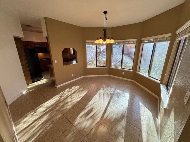 Building Photo - Stunning 3Bed/2Bath/2Car 1st Floor Condo with Private Yard, and Luxurious Amenities! $300 Off Mov...