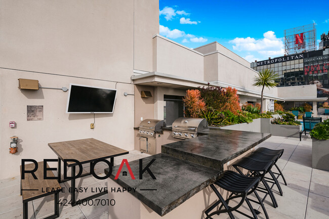 Building Photo - 5837 1/5 West Sunset Blvd-216