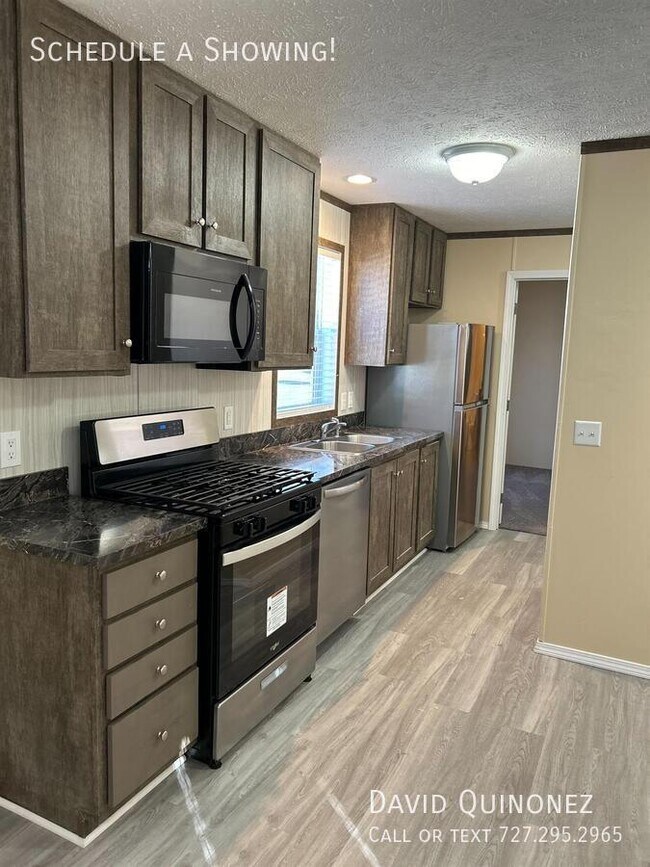Building Photo - Sale Prices Starting at: $42,999 Lease to ...
