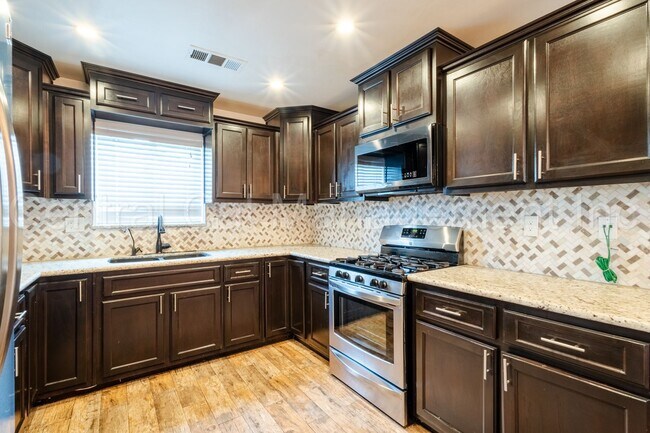 Building Photo - 4 Bedroom/2 Bath Home with Paid Solar - $2...